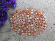 Load image into Gallery viewer, Peach Moonstone Cushion (Square) Cabochons - 5mm