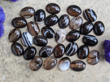 Load image into Gallery viewer, Banded Onyx Black Oval Cabochons - 15x20