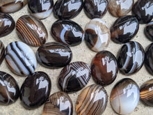 Load image into Gallery viewer, Banded Onyx Black Oval Cabochons - 15x20