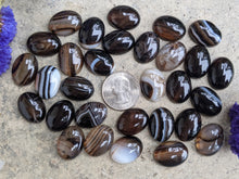 Load image into Gallery viewer, Banded Onyx Black Oval Cabochons - 15x20