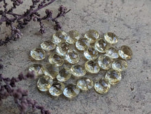 Load image into Gallery viewer, Lemon Quartz Fancy Double Pointed Facets - 5.5mm
