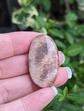 Load image into Gallery viewer, Black Sunstone Oval Cabochon
