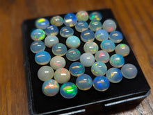 Load image into Gallery viewer, Ethiopian Welo Opal Imperfect Round Cabochons - 8mm
