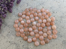 Load image into Gallery viewer, Peach Moonstone Round Cabochons - 4.5-5mm
