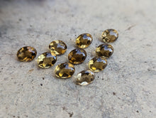 Load image into Gallery viewer, Champagne Quartz Domed Oval Facets - 6x8mm
