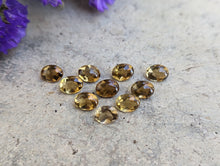 Load image into Gallery viewer, Champagne Quartz Domed Oval Facets - 6x8mm
