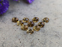 Load image into Gallery viewer, Champagne Quartz Domed Oval Facets - 6x8mm
