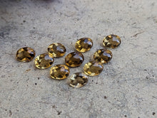 Load image into Gallery viewer, Champagne Quartz Domed Oval Facets - 6x8mm
