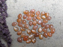 Load image into Gallery viewer, Peach Moonstone Teardrop Cabochons - 5x7mm
