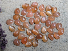 Load image into Gallery viewer, Peach Moonstone Teardrop Cabochons - 5x7mm
