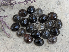 Load image into Gallery viewer, Tourmalinated Quartz Oval Cabochons - 10x12mm
