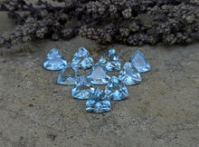 Load image into Gallery viewer, Sky Blue Topaz Trillion Facets - 7mm
