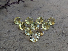 Load image into Gallery viewer, Lemon Quartz Round Facets - 8mm
