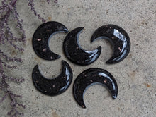 Load image into Gallery viewer, Nuumite Crescent Moon Cabochons
