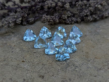 Load image into Gallery viewer, Sky Blue Topaz Trillion Facets - 7mm
