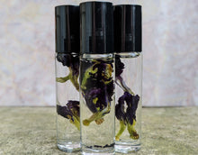 Load image into Gallery viewer, Blue Lotus Blossom and Amber 10ml Perfume Roller
