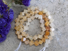 Load image into Gallery viewer, Yellow Aventurine Shaded Cube Beads
