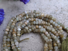 Load image into Gallery viewer, Cat&#39;s Eye Quartz Faceted Rondelle Beads
