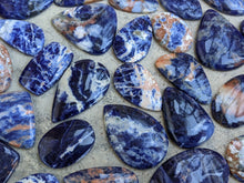 Load image into Gallery viewer, Sunset Sodalite Cabochons
