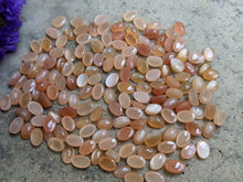 Load image into Gallery viewer, Peach Moonstone Oval Cabochons - 4x6mm

