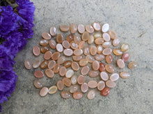 Load image into Gallery viewer, Peach Moonstone Oval Cabochons - 5x7mm
