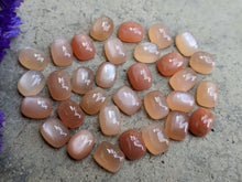 Load image into Gallery viewer, Peach Moonstone Rectangle Cabochons - 7x9mm
